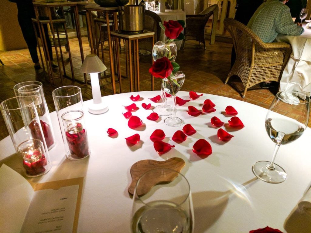 alt="romantic dinner at a restaurant for Valentine's"